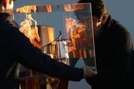 Olympic Flame Displayed A Day After Tokyo Games Postponement Announced